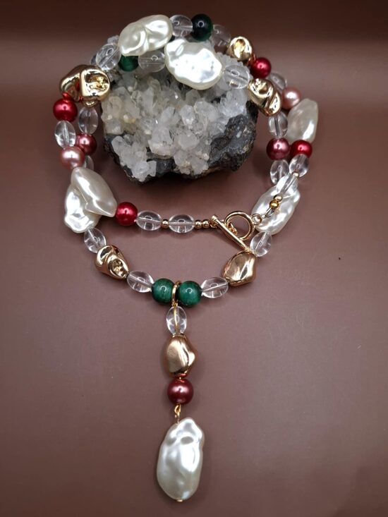 Mountain crystal, faux pearls, tiger eye. Gilt details. 62 cm. 
