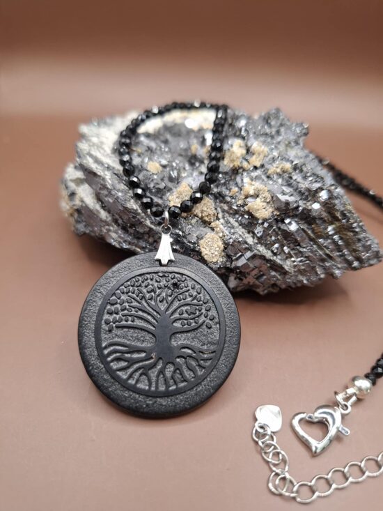 Shungite pendant. 3.5 cm diameter. Chain - spinel. 47 cm. 