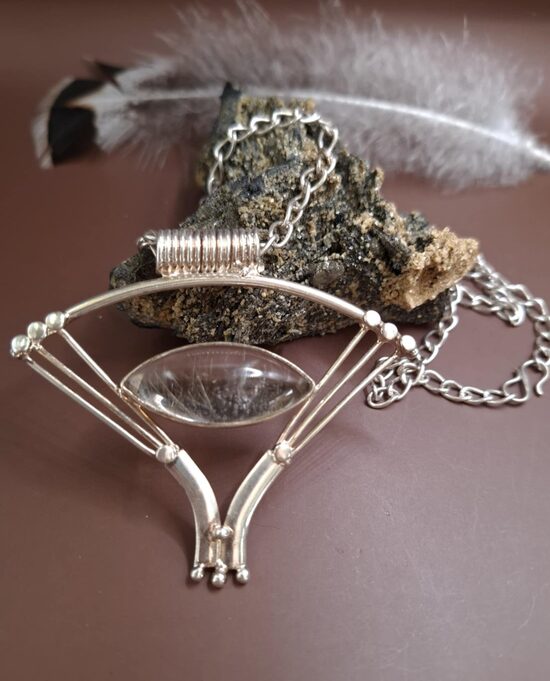 Rutilated quartz. Silver. Pendant 7x6 cm. 47 cm.