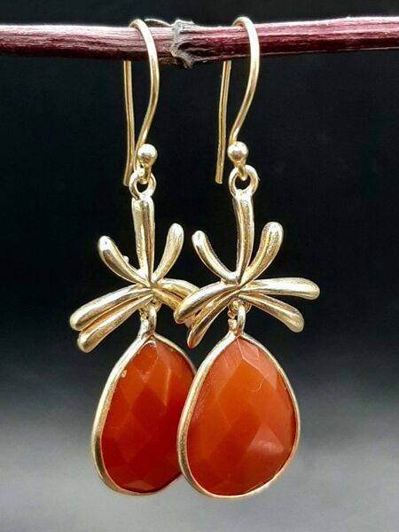 Carnelian. Silver plated with gold. 3.5 cm from the hook.