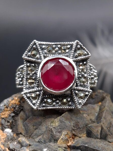 Ruby, marcasite. Silver. Surface 1.6 cm. Size 6.