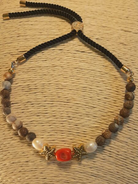 Agate, coral, pearl. Gilded parts. Adjustable. 