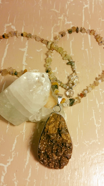 Pyrite pendant 5.5 cm. Bead of different stones 68 cm 
